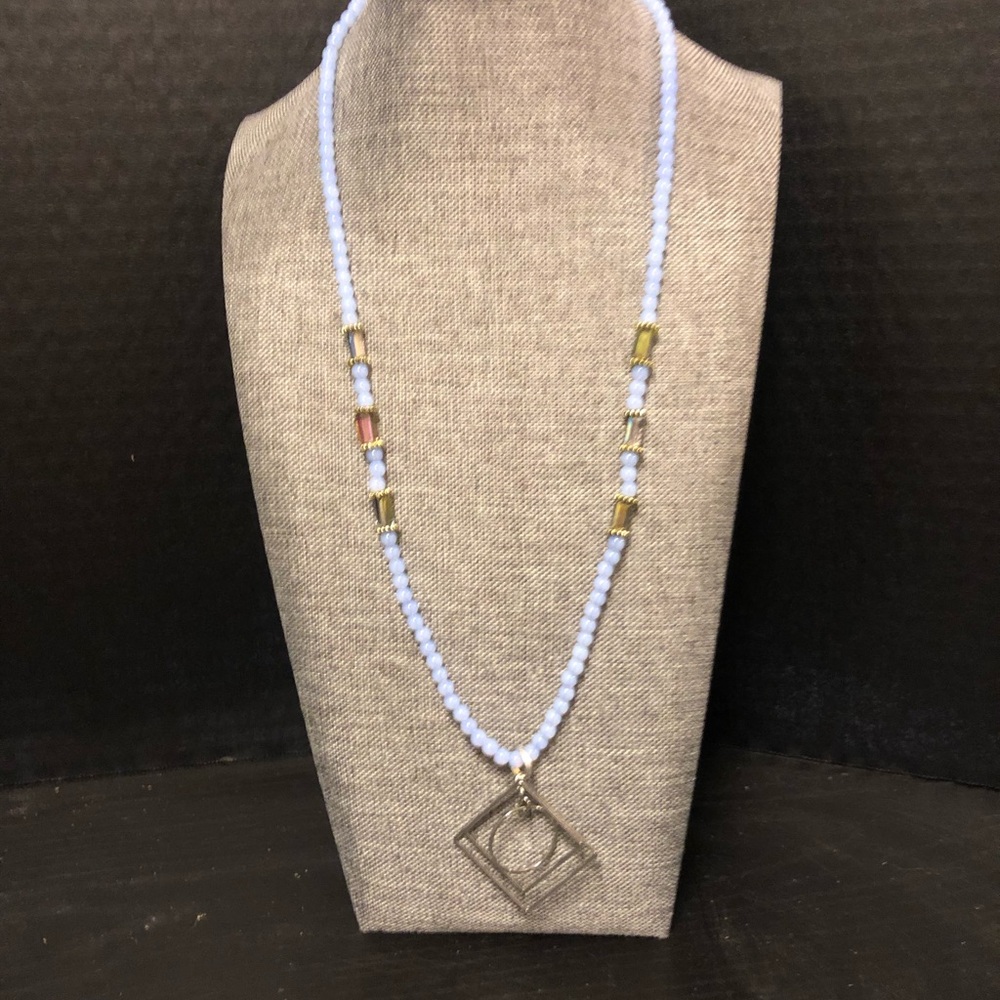 Diamond with a circle pendant